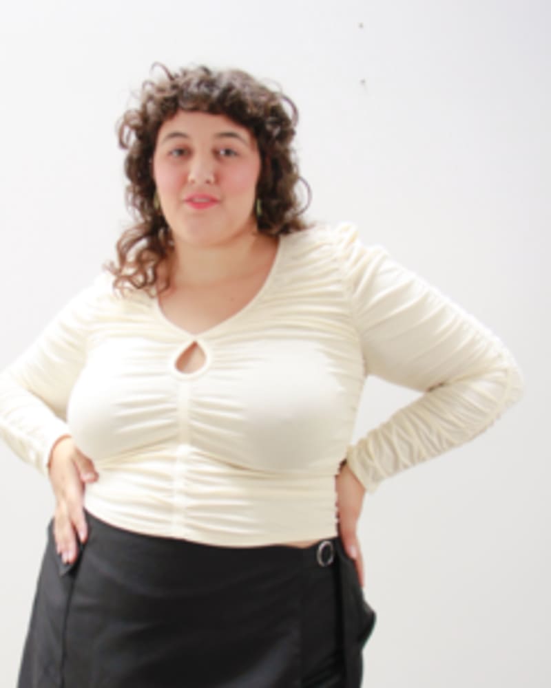 Front of a model wearing a size L Pucker Up Cutout Ruched Top in Pearl by Lovefool. | dia_product_style_image_id:249565